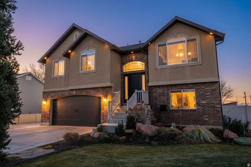 Multiple offers received Highest and Best by Sunday at 5:00 pm.  Beautifully updated home located in desirable Perry, Utah. The spacious primary suite features a resort-style bathroom, creating a private retreat. Step out onto the expansive back deck-perfect for grilling, entertaining, and enjoying stunning views. This property offers excellent RV parking and an extra-deep two-car garage, with a third garage thoughtfully positioned behind-ideal for additional storage, a workshop, or toys. The home provides storage and is situated in a fantastic neighborhood. A must-see-schedule your showing today.