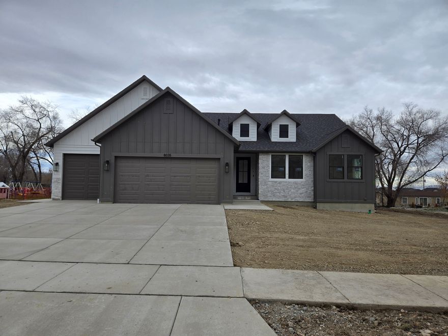 This brand-new rambler is nestled in the rural community of Lake Point which is located just 30 minutes from SLC.  With an estimated completion date in Feb 2026 this home has been customized with every structural and finishing detail meticulously thought out. Featuring high-end finishes such as a Craftsman style exterior, custom cabinetry with soft close doors, stainless steel appliances, double ovens, gas cook-top, and gas fireplace. The family room will be finished with an expansive 11-foot ceiling with grid styled stained beams.  Enjoy the rural setting from the large 17x19 covered trex deck which will be finished with black steel railing and have a gas line stubbed.  The unfinished basement is set up for 3 additional bedrooms,1 bathroom and has been prepped for a future wet bar. Last 8 photos are of a past build job that is similar. Photos for reference only, finishes will vary.