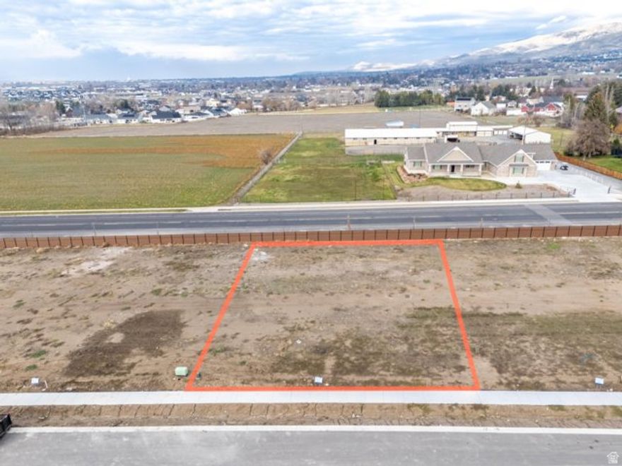 LOT 12 Smiling H Subdivision is an inviting community located in charming North Logan, Utah. This beautifully designed neighborhood offers a variety of amenities and features that cater to any lifestyle. Residents can enjoy the nearby recreational activities, including pickle ball courts, a splash pad for fun on warm days, and even an ice rink for winter sports enthusiasts. A public library and a police department nearby enhance the community's convenience and security. Families will appreciate the close proximity to schools, making it easy for children to access quality education. Additionally, every building lot is equipped with secondary water connections which is a big saver for the overall water bill. The availability of high-speed fiber internet provides residents with excellent connectivity for work and leisure. The fiber internet bill is part of the low monthly HOA fee of $65. Overall, Smiling H Subdivision offers a harmonious blend of nearby recreational opportunities and essential services, making it an ideal place to call home.