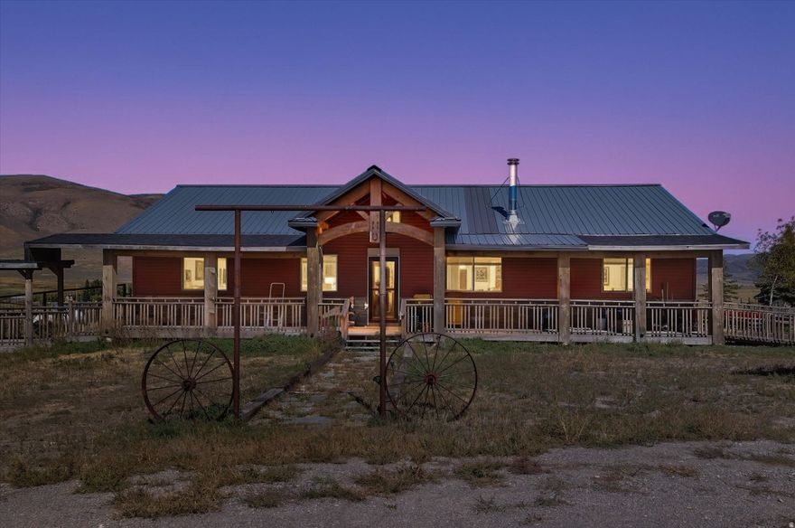 Just outside Elba, Idaho, this 10.33-acre setup sits minutes from the entrance to City of Rocks - one of the most sought-after climbing and hiking destinations in the Pacific Northwest. But even if you never lace up a hiking boot, the sunsets and star-gazing alone are worth the drive out. The main home is all one level, three bedrooms, with a fireplace great room and a kitchen that's genuinely impressive - double wall ovens, big island, built-in range, oversized pantry. The primary suite has a soaking tub and walk-in shower. The insulated shop swallows 6+ vehicles. And the nearly new 3-bed ADU is the kind of bonus that makes this property almost unfairly good. It's perfect for the mother-in-law - separate entrance, her own space, your sanity intact. You're welcome. Fully fenced. Cross-fenced for horses. Room to breathe. Come see it - you won't want to leave.