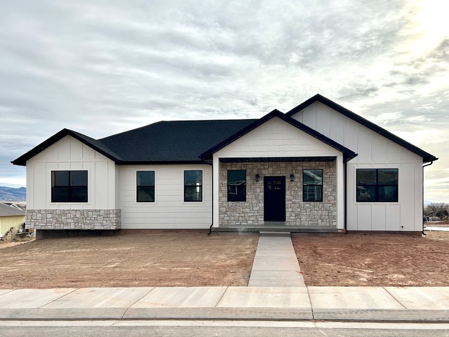 Don't miss another JL Construction home! All of our builds come with a comprehensive one year builders warranty! This spacious home is located in a the nice, quiet subdivision Rocky Point Estates on the west side of Gunnison. This home is built with quality finishes including quarts countertops, Moen plumbing fixtures, and a nice deep tub in Master suite. You will love the user friendly layout of this home. The massive garage can fit 2 cars with lots of room to spare. The Basement has 9ft ceilings and so much space to finish how you want it. We include tankless on-demand water heater and a water softener installed in all of our builds. This home is move in ready now! Don't wait! Schedule a showing today!