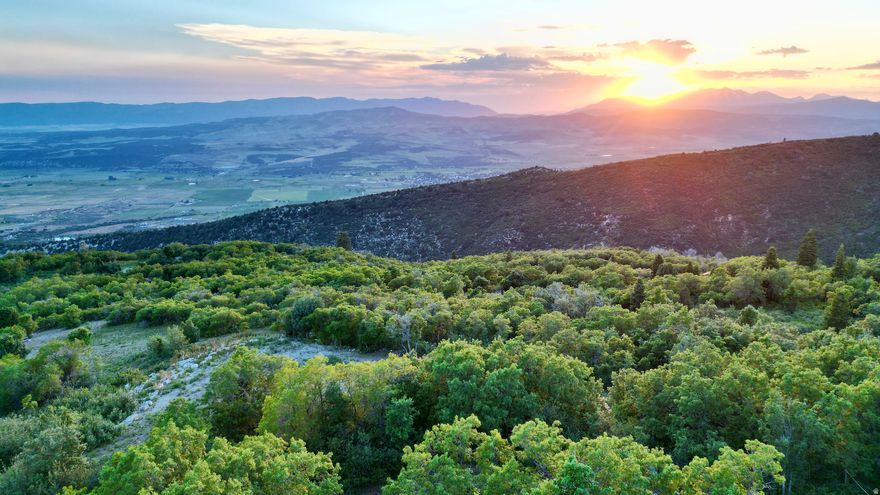 Rare opportunity to own one of the most build-ready lots in Legacy Mountain. Lot 74 has already undergone significant improvements, saving the next owner both time and expense. A building pad has been professionally cut, and water and electrical connection fees have already been paid, with utilities run directly to the pad. Also valuable, septic permits have been pulled and paid for, meaning much of the groundwork required to begin construction is already complete. Perched in an elevated location, the property offers stunning 360-degree views of the surrounding mountains and valleys, capturing both expansive alpine scenery and distant valley lights. Whether you're envisioning a a year-round residence, mountain getaway, or investment cabin, this lot provides the rare combination of infrastructure, views, and readiness to build. Seller financing available with negotiable terms and a minimum 30% down payment, offering flexibility for buyers looking to secure mountain property without traditional financing. Come walk the property and experience the views for yourself.