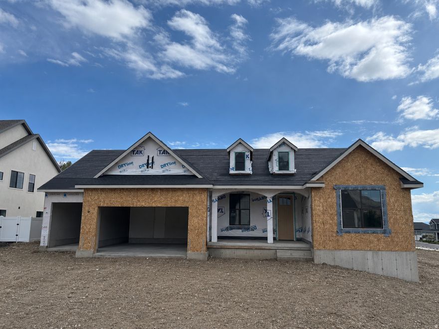 LOT #117 - The "Treble" plan by Symphony Homes is sure to be a standout, with an estimated completion in September. Designed in a timeless farmhouse style with brick and Hardie exterior, this home offers an open, spacious layout with thoughtfully curated designer finishes throughout. Interior highlights include custom wainscoting, shiplap accents, crown molding, a beautiful fireplace, and a built-in mudroom bench with hooks. The galley-style kitchen is both functional and refined, featuring a column refrigerator and freezer, double wall ovens, a 36" 5-burner gas cooktop, and a butler's pantry. The fully finished basement is designed for entertaining, complete with a game room, wet bar, one full bathroom, one half bathroom, and a large finished storage room with built-in shelving, plus additional cold storage. Enjoy outdoor living on the covered patio, and take advantage of the extended 41' deep third-car garage-perfect for extra vehicles, toys, or storage. Full landscaping is included.