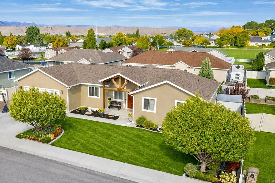 Located in one of Price's most sought-after and established neighborhoods, 108 North Balsam Drive offers an exceptional blend of space, style, and thoughtful upgrades across 3,024 square feet of beautifully maintained living space.  This impressive home features 5 spacious bedrooms and 3 full bathrooms, providing flexibility for family, guests, and entertaining. The heart of the home is warm and inviting, with generous living areas, quality finishes, and an effortless flow designed for both everyday living and hosting.  The newly remodeled basement is a true standout-featuring a large family room, perfect for movie nights or gatherings, and a wet bar that elevates the space into a premier entertainment area. Whether hosting friends or enjoying a quiet evening, this lower level adds both luxury and functionality.  Upstairs and down, you'll appreciate the abundance of storage, including a large garage and extensive RV parking, making this property ideal for those with recreational vehicles, trailers, or multiple toys-an increasingly rare find in town.  Outside, the home sits in the heart of Westwood, known for its pride of ownership, peaceful streets, and upscale feel. This is a neighborhood where homes are cared for and value is protected.  With its combination of space, recent updates, RV parking, and premier location, this property stands out as one of the most complete offerings currently available in Price.   Square footage figures are provided as a courtesy estimate only and were obtained from County Records .  Buyer is advised to obtain an independent measurement.