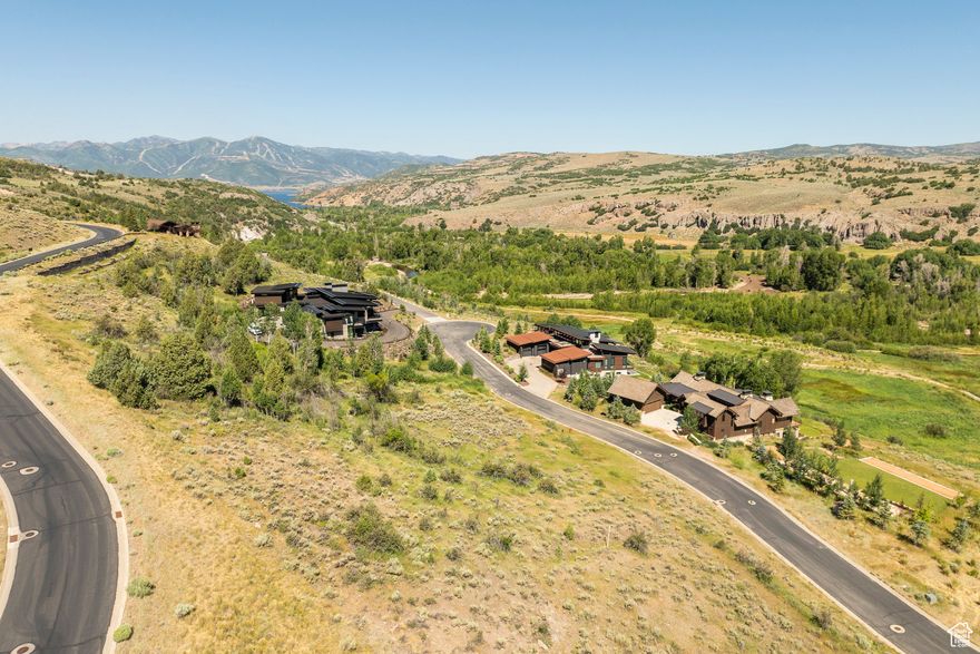 This lot situated across from the Provo River also provides special views of Deer Valley, the Rock Cliffs, and the Uinta Mountains. Don't miss this unique opportunity to build you dream home steps from the Upper Provo River on this ideally located homesite, surrounded by so much of Utah's natural beauty and situated on a quiet street on a cul-de-sac.  Within a short walk, you'll find The Post Clubhouse, a year-round heated pool, and exceptional dining at The Freestone Lodge, making this location ideal for those seeking a blend of outdoor adventure and refined amenities.  Victory Ranch is a private, four-season community amidst 6,250 pristine acres along four-miles of the Upper Provo River. Amenities include an 18-hole Rees Jones golf course, world-class fly-fishing, fishing ponds, restaurants, a ski-in/ski-out lodge in Park City and more than 3,500 acres of untouched backcountry. Victory Ranch is approximately 20 minutes to Park City and 15 minutes to Deer Valley.