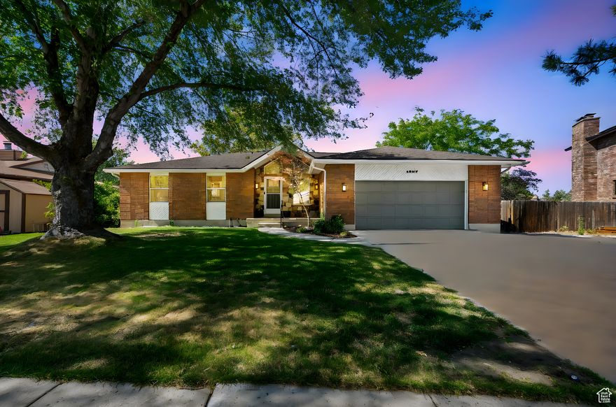 Beautifully updated brick rambler near the heart of Fort Union offers the perfect blend of style, function, and versatility. With its desirable location just minutes from Highland Drive, Fort Union Boulevard, I-215, shopping, dining, parks and schools, this home lends both convenience and character. Inside, you'll find gorgeous upgrades such as engineered hardwood floors, custom cabinetry, quartz countertops, Bosch appliances, updated windows, and a very functional layout that brings refinement to every room. The basement has its own private entrance and is primed to become a fully separate apartment with the simple addition of a kitchen-ideal for guests, family, or an income stream. Outside, a full-fenced, beautifully landscaped .24-acre lot with mature shade trees and a private back deck provides a serene and private retreat with gorgeous mountain views.