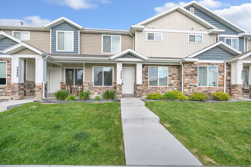 Well-cared-for townhome in the desirable Green Canyon Square community in North Logan - east of Main, minutes from Utah State University, Green Canyon trails, Logan Regional Hospital, and downtown shopping. The open main-floor plan features a granite kitchen with a large island flowing into the living and dining area, plus a convenient half bath. Upstairs offers three generously sized bedrooms, a flex loft (ideal for office, media, or playroom), and a primary suite with private en-suite bath and walk-in closet. Attached 2-car garage, full landscaping, and a low-maintenance HOA that covers water, sewer, trash, and snow removal. Cache School District / Green Canyon High. Move-in ready and easy to show. Buyer and buyer's agent to verify all information.