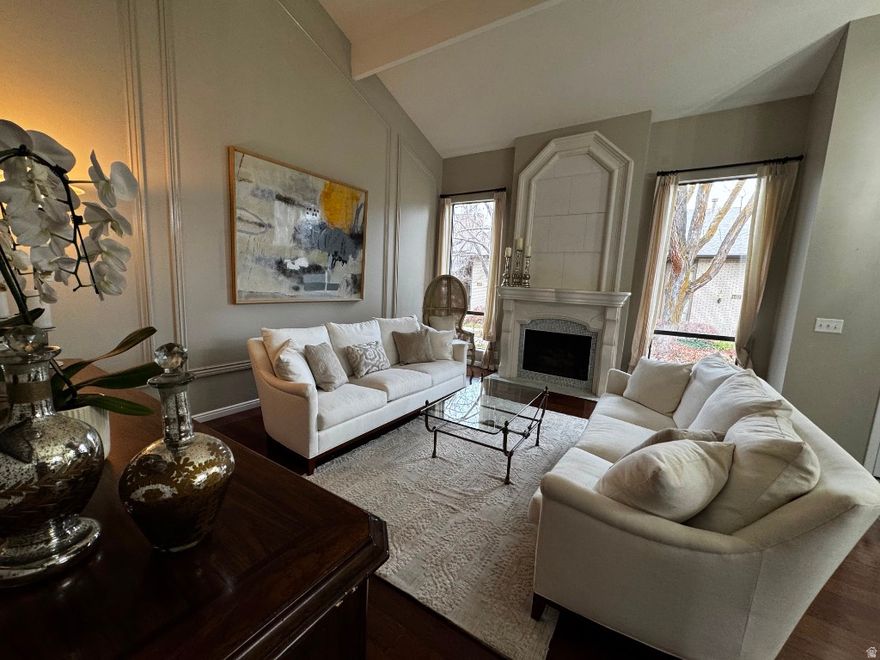 Come see this beautiful townhome in the prestigious Brookstone community. Rooms are spacious with vaulted ceilings in the main living area and hardwood flooring throughout the main level. The gorgeous living room has a warm inviting gas fireplace with a beautiful, custom mantle. The family room off of the kitchen is a unique feature with French doors that access a private patio, gas fireplace, custom storage closets and exposed wood beams in the ceiling. The updated kitchen is beautiful! It has Carrara marble countertops, tile backsplash, stainless appliances, clean white craftsman style cabinets, pendant lighting over the island and plenty of room for a large table. Recessed lighting throughout the main level & LED updated lighting elsewhere including the outlets and switches. New paint on the walls including the large 2 car garage. Large basement with huge family room, 1 bedroom, 1 full updated bathroom & a large storage room that is accessible from the garage as well.