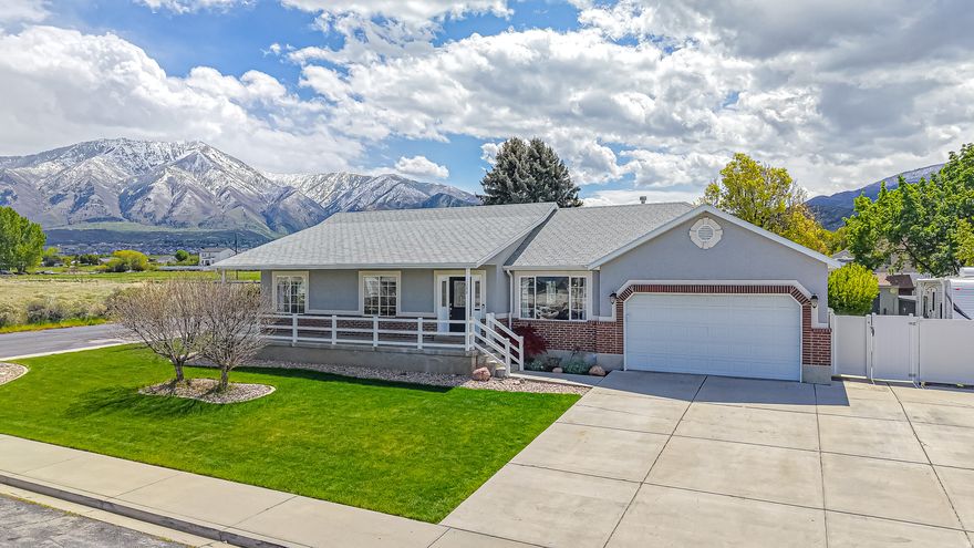 *Be sure to Click the Tour link for a 3-D virtual Tour* Welcome to this charming and versatile Payson property featuring a fully equipped Accessory Dwelling Unit (ADU)-perfect for multi-generational living or added flexibility for guests. From the moment you arrive, you'll feel the care and thought that has gone into creating a space that is both functional and inviting. The main home offers comfortable living, including a bedroom with a built-in Murphy bed, maximizing space and usability. The separate basement apartment includes walk-out stairs and a private entrance, offering both privacy and convenience and the ability to generate rental income to help offset your mortgage. Step outside and you'll find a backyard designed to truly be enjoyed. Mature fruit trees including cherry, plum, peach, and apple create a beautiful and productive setting. A greenhouse and chicken coop offer the opportunity for sustainable living, while the dog run with a heat lamp keeps pets comfortable year-round. There's also RV parking and a spacious Trex deck, perfect for relaxing or entertaining. Inside, the home is equipped with a carbon-filtered water system connected to the water softener, providing purified water throughout the entire home an added feature you'll appreciate every day. With its unique features, thoughtful upgrades, and warm, welcoming feel, this property offers something special both inside and out all in a peaceful Payson neighborhood close to parks, schools, and everyday conveniences. Come experience everything this one-of-a-kind property has to offer!