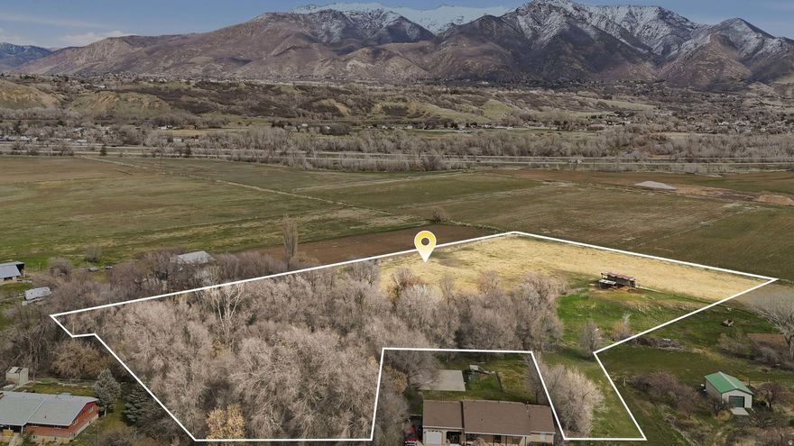 5 Acres with future development potential in South Weber. This beautiful 5-acre parcel offers incredible mountain and valley views and is currently zoned-agricultural and enrolled in the Greenbelt for reduced property taxes. According to the city's future land use map, the area is identified for potential Low Density Residential, creating an appealing opportunity for builders, developers, or long-term investors (buyer to verify all zoning and development possibilities with the city). Greenbelt rollback taxes may apply if the property is removed from the program. Buyer to verify all information.