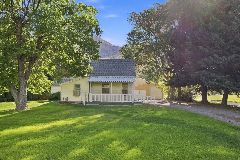 Photo of 10920 N HWY 38, Deweyville, UT 84309 (MLS # 2183715)