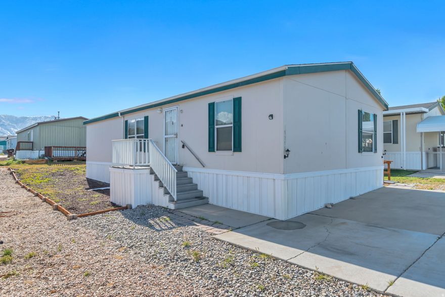 Charming manufactured home in Tooele featuring 3 bedrooms and 2 bathrooms with a comfortable, functional layout. The primary suite includes a private full bath with a relaxing soaking tub. Enjoy peace of mind with recent updates completed last year, including flooring, fixtures, and finishes, giving the home a fresh, modern feel. Great opportunity for affordable living with style and convenience! Buyer to verify all.