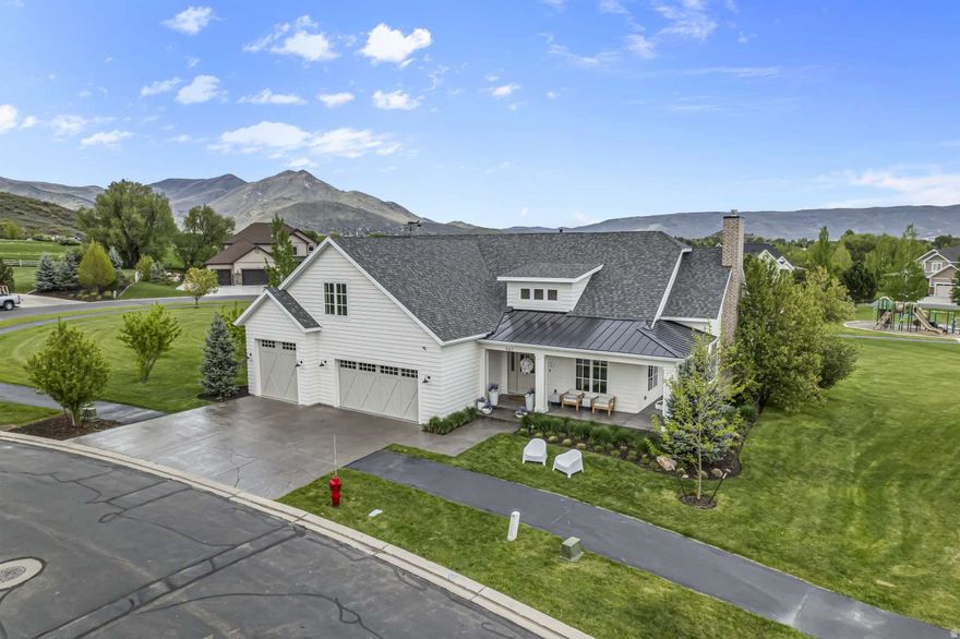 Nestled in the highly sought-after Cascade Meadows community of Midway, this stunning 5-bedroom, 5-bathroom mountain retreat offers over 5,300 square feet of thoughtfully designed living space, blending luxury, comfort, and year-round recreation. Built in 2015, the home features an open-concept layout with high-end finishes throughout, including hardwood floors, custom millwork, and a gourmet kitchen equipped with premium appliances. The main-level primary suite provides a private sanctuary, while expansive gathering areas, a theater room, and a unique bunk room with built-in beds make it ideal for entertaining guests. Surrounded by breathtaking views of the Wasatch Range and located just minutes from world-class skiing, golf, fly fishing, and outdoor trails, this property delivers both refined living and direct access to Utah's best mountain lifestyle.