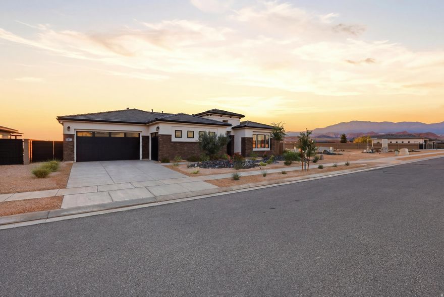 Presenting 81 N Highland Parkway, a meticulously maintained luxury home located in the highly sought-after Views at Coral Canyon community in beautiful Washington. Perched on a scenic mesa with breathtaking panoramic views, this like-new home offers a unique blend of luxury, comfort, and Southern Utah living. Built in 2023, this thoughtfully designed 2,500 square-foot home features 4 spacious bedrooms all with beautifully appointed ensuite bathrooms. 10-foot ceilings, abundant natural light, and an expansive multi-panel sliding door create a bright, open atmosphere that seamlessly blends indoor and outdoor living.  A well-appointed, gourmet kitchen flows seamlessly to the great room, which features a contemporary linear fireplace surrounded by stylish built-in shelving and cabinetry. The backyard retreat features a sparkling pool, a contemporary fire feature, private seating areas, a covered dining area and spectacular views overlooking the St. George area -- perfect for entertaining or relaxing under the desert sky. Bordering a community common area, the property enjoys added openness for even greater views.  The  3-car garage with two mini-split units provides year-round comfort and flexibility. Residents enjoy outstanding Coral Canyon amenities including parks, pickleball courts, walking trails, green space, a community lap pool and year round hot tub.  Conveniently located near Sand Hollow Reservoir, Zion National Park, world-class golf, shopping, dining, and freeway access, this home truly offers the best of Southern Utah.