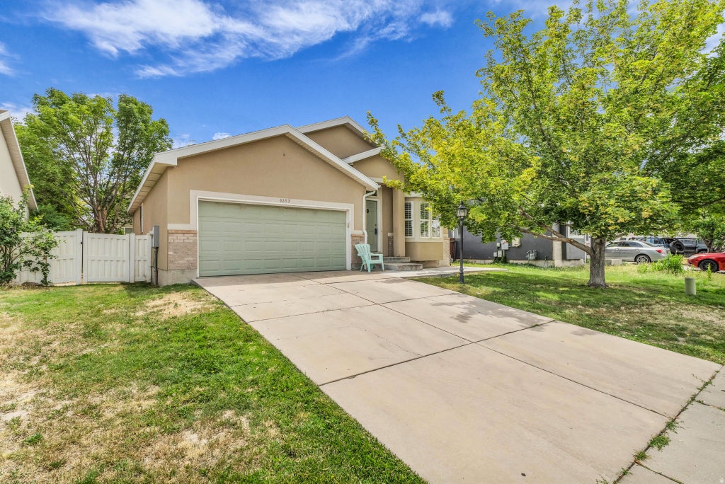 Photo of 3293 W BROOKWAY DR, West Valley City, UT 84119 (MLS # 2170088)