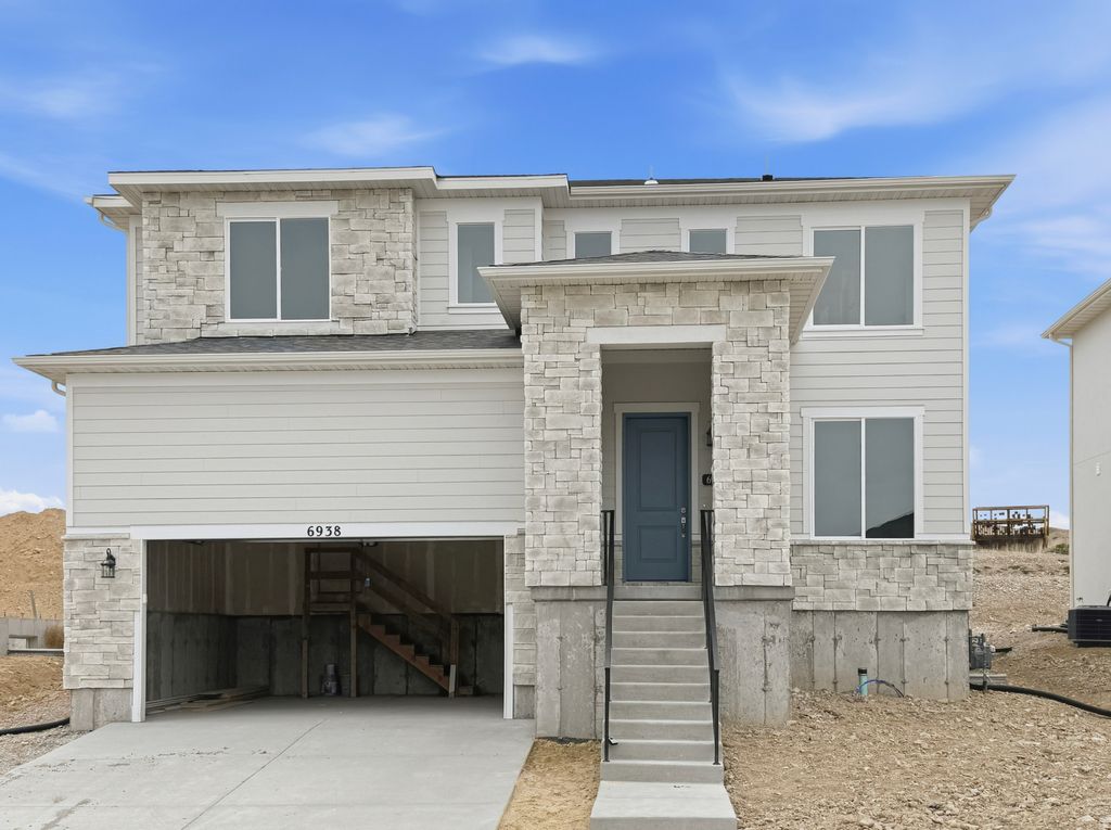 Photo of 6938 W W POINTE CEDAR LN ST #331, West Jordan, UT 84081 (MLS # 2130119)