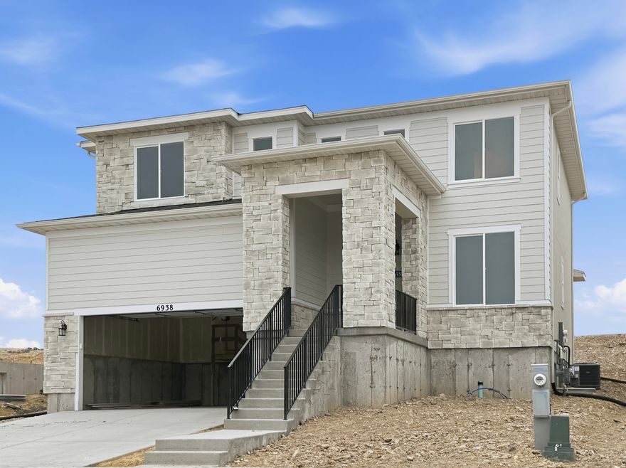 Welcome to Oquirrh West! This beautiful new-build two-story home features stylish upgrades throughout and a layout designed for comfortable living and entertaining. The spacious kitchen offers tons of counter space and opens seamlessly to the main living areas, making it perfect for gatherings. With four bedrooms, a versatile loft, and plenty of room to relax or host, this home blends style, function, and space in a design made to enjoy.   Enjoy sweeping mountain views that provide a stunning backdrop year-round, along with the lifestyle and value that come with being part of one of our most desirable neighborhoods. A rare opportunity to secure a premier homesite in a community people continue to love