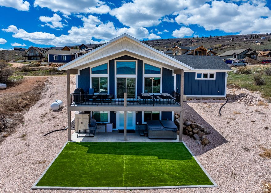 NIGHTLY RENTAL IN BEAUTIFUL BEAR LAKE! SOLD FULLY FURNISHED! Sleeps 20 with parking for 6 vehicles.  Sold turn key stocked and ready to rent out with two water heaters and two washer and dryers. Beautiful decor featuring shiplap, farm sink, LVP and great room!  Relax in the Bullfrog spa or on the covered deck and enjoy the beautiful view of the lake and cool summer nights!  Spacious great room and family room perfect for entertaining! You must see inside!  Great access year round with incredible views of Bear Lake!!    Square footage figures are provided as a courtesy estimate only. Buyer is advised to obtain an independent measurement.