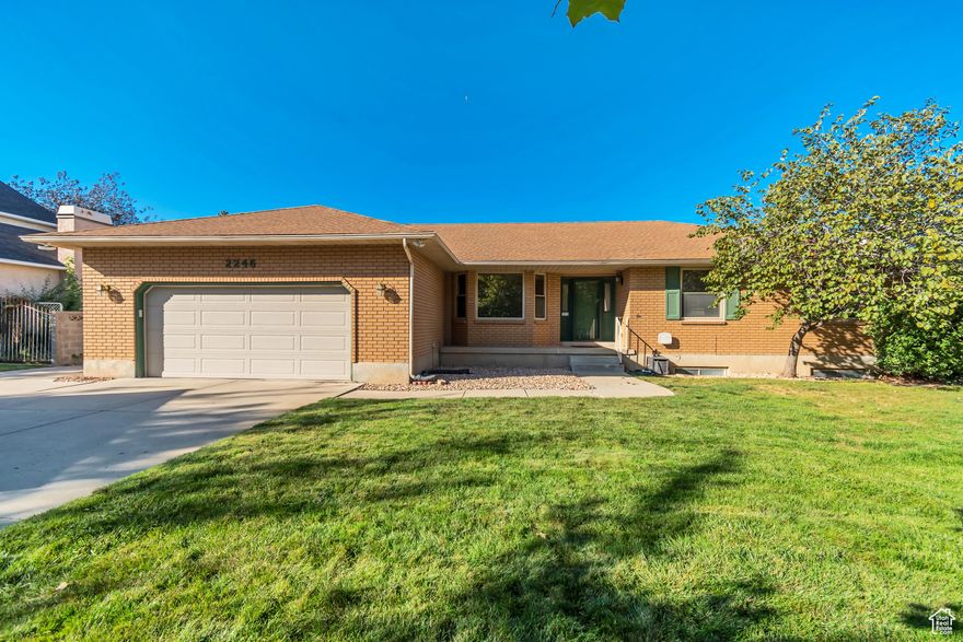 This well-maintained, south-facing rambler is on a quiet, tree-lined street and offers a remodeled kitchen, energy-efficient insulated vinyl sliding doors (replacing the original French doors), cozy wood-burning stove insert, a private, fully fenced yard--perfect for relaxing or entertaining. Situated on a generous 1/3 acre lot, the home features an extra-deep two-car garage with a 220V electric outlet , RV parking, and a deck with a gazebo.