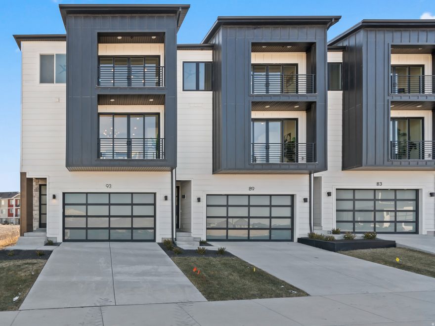 Under Construction. Estimated completion Fall 2025. ***Rates as low as 4.375% available via preferred lender. Inquire for more info** Nestled in a prestigious resort-style community right along Talons Cove Golf Course, this stunning 3-story luxury townhome redefines elevated living. The first floor features a versatile space-perfect as an office, guest room, or flex area-along with a half bathroom. You'll find the heart of the home on the second floor; a stunning open-concept kitchen, dining, and living area with floor-to-ceiling windows at both ends that fill the space with natural light, creating an inviting atmosphere for gatherings and everyday living. The top floor is where you'll find three bedrooms, including the luxurious primary ensuite with its own private patio accessed by floor-to-ceiling glass doors, allowing you to take in awe-inspiring views of Utah Lake and Mt. Timpanogos. The HOA community offers incredible amenities including a year-round natural heated mineral pool fed by the local hot springs as well as a second outdoor swimming pool, a private boat dock and marina on Utah lake, two clubhouses with workout facilities and event space in addition to a large pavilion for hosting bigger crowds, and multiple parks and playgrounds connected by miles of walking and nature trails. With breathtaking views, premium finishes, and unparalleled amenities, this is more than just a home-it's a lifestyle. Photos provided of model home. Seller open to trade offers.