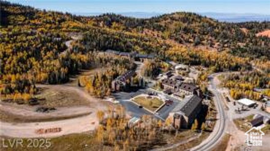 Tucked amid the alpine beauty of Brian Head, Utah, Cedar Breaks Lodge offers a tranquil mountain escape beside the Navajo Ski Trails. From this privately owned studio, sweeping views of pine forests & rugged peaks invite both adventure & rest. The space is warm & inviting, featuring a gas fireplace & a kitchenette with a microwave-perfect for easy meals after a day outdoors-& a jetted tub in the full bath for pure relaxation. Resort amenities include an indoor pool, Jacuzzi, sauna, fitness center, elevators, & underground parking for convenience. Whether carving slopes in winter or exploring Bryce Canyon & Zion in summer, every season offers discovery. End the day with BBQs, playground fun, or seasonal games under the stars. Dcor, highlighted by Rock Photographer Carl Dunn's photos.