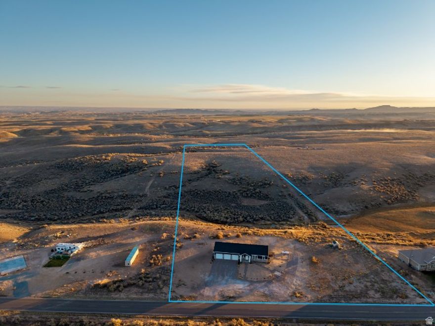 COUNTRY LIVING AT ITS FINEST! Escape to tranquility with this exceptional property offering 11.93 acres of serene country living and panoramic views. Built in 2021, this nearly new home features a 1200 sq. ft. on main level and 1200 square feet in basement that is 50% finished.  A large 3-car garage provides plenty of room for vehicles and storage.