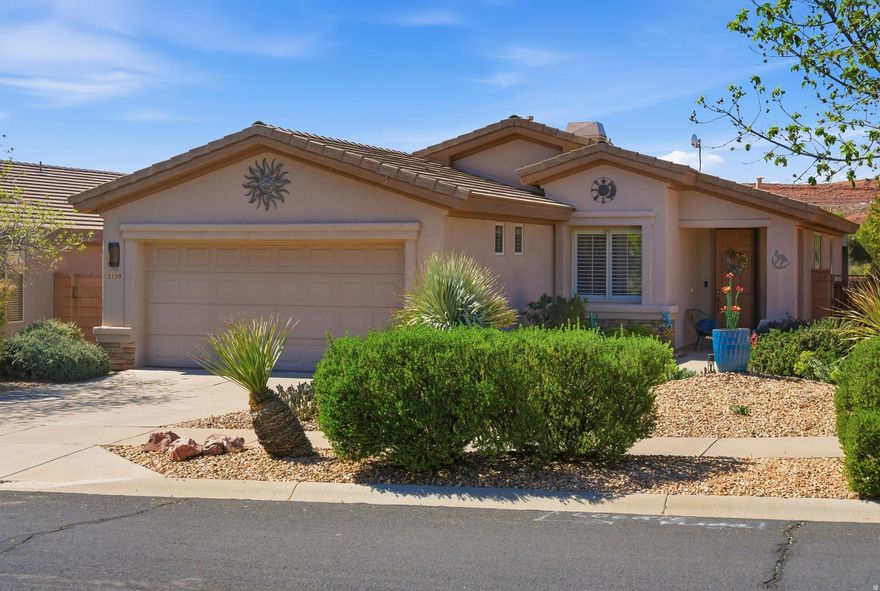 Located in Coral Canyon, this single-level home feels bright and welcoming with tall ceilings and natural light throughout. Fresh paint, new carpet, shutters, water softener, and an instant hot water heater add comfort, while the EV charger and low-maintenance xeriscape yard keep things easy. French doors give the 3rd bedroom flexible use as an office or guest space. Relax on the covered patio with Pine Valley Mountain views and enjoy community amenities like a pool, pickleball, tennis, and fitness center.
