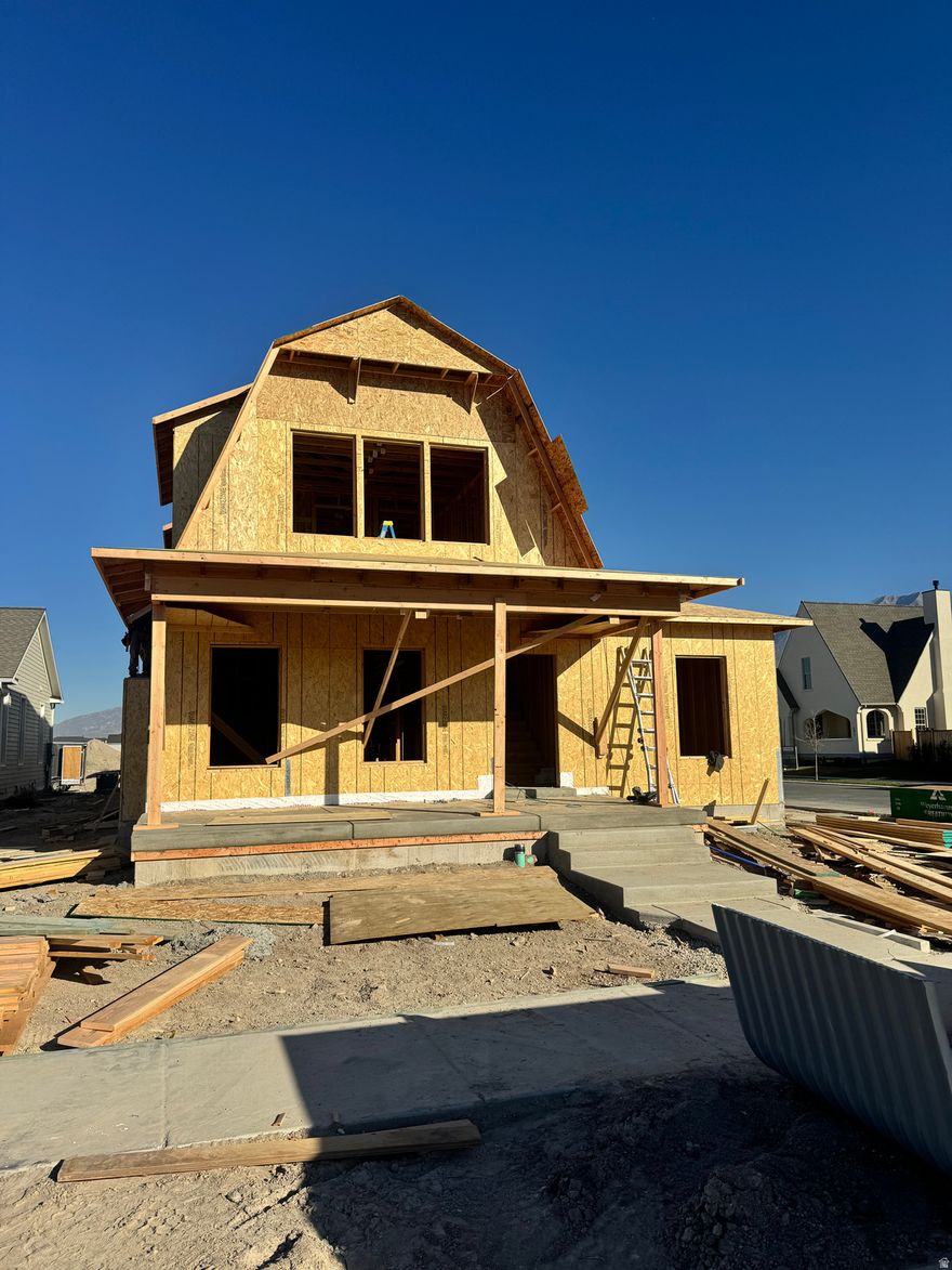 GETTING STARTED - HOME LOOKS INCREDIBLE...UNDER CONSTRUCTION - EST COMPLETION 4.1.26 - STRUCTURAL OPTIONS HAVE BEEN CHOOSEN - GET IN BEFORE 11.30.25 TO PICK INTERIOR OPTIONS...Built by Goodboro Homes, this stunning Gambrel cottage home is located in the desirable Holdaway Fields neighborhood in Vineyard, offering breathtaking lake and mountain views. This is a spectacular corner lot! The home features a beautiful kitchen, an open floor plan with plenty of windows for natural light, and gorgeous upgraded finishes throughout. The spacious primary suite boasts his & her walk-in closets for added convenience and luxury. Designed for main floor living, this home provides everything you need on the main level with the option to finish the basement for even more space. Located in the heart of Utah County, you'll be just minutes from the Utah Lake trail system, Sleepy Ridge Golf Course, Megaplex, Top Golf, shopping, dining, and more. The community will include 162 homes, a clubhouse, swimming pool, and pickleball courts. Holdaway Fields embraces traditional Utah architecture with classic cottage, craftsman, and tudor style homes. Homes in this community intentionally define the street edge with open yards, front porches, and beautiful entries.