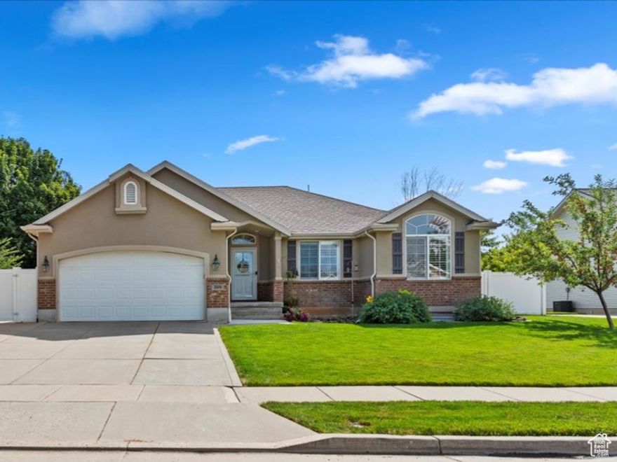 Welcome to one of Morgan's most desirable neighborhoods with a show stopping kitchen at it's heart and permanent holiday lighting for year-round curb appeal. Thoughtful updates include luxury vinyl plank flooring and a spacious deck ready for summer barbecues and evenings around the fire pit. The yard has been well cared for and features fruit trees and 2 sheds for extra storage. The RV pad adds convenience for parking toys or trailers. Located close to schools, parks, and all that Morgan has to offer, this home is as functional as it is beautiful. Square footage figures are provided as a courtesy estimate only and were obtained from county records. Buyer to verify all information.