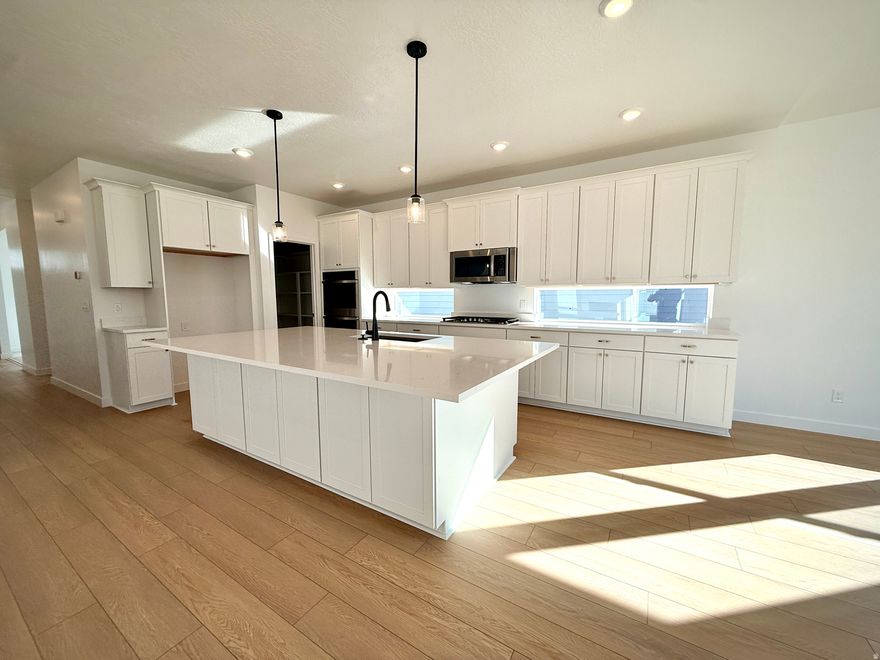 This is your chance to live in the home that won the 2025 Utah Valley Parade of Homes Judges' Choice award.  This amazing home is located in Firefly, the master-planned community built specifically for kids to live life unplugged. Stop fighting over screen time and start reconnecting in an environment engineered to encourage play. Firefly isn't just a neighborhood, it's a 350+ acre network of parks, trails, and amenities designed to inspire adventure and activity. The day you move in, your kids will be enjoying the skate and wheels park, the bike pump track, the downhill mountain bike course, pickleball and basketball courts, neighborhood playgrounds, and miles of trails. Is your child shy?  Firefly has the region's only full-time Activities Director curating weekly activities and events for all ages, encouraging families and neighbors to connect in nature. Located in Eagle Mountain, Firefly is an easy commute to the Silicon Slopes, with close proximity to shopping and entertainment. Just 40 miles south of Salt Lake City and 30 miles north of Provo, it's one of Utah County's fastest-growing cities. Book a tour of this beautiful Candlelight home, explore all the amenities, and see for yourself why Firefly is the best place in Utah to raise your kids.