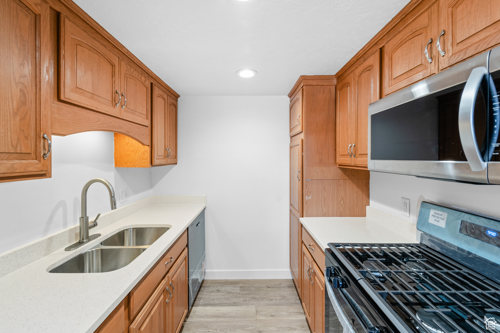 This home features all new flooring, fresh paint throughout, new carpet, and updated bathroom vanities. Every appliance has been upgraded and is brand new, including a new washer and dryer. It's spotless from top to bottom and offers the best value in the area. Don't miss this one!