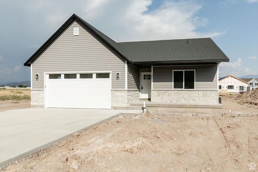 Come and see this brand-new single-level home in a great Preston location! The home features three bedrooms and two full bathrooms, white kitchen cabinets, vaulted ceilings, and lots of natural light. The spacious primary bedroom features a large walk-in closet and a private full bath. A big front porch adds charm and extra space to relax. There's still time to pick some of the finishes and make it your own!