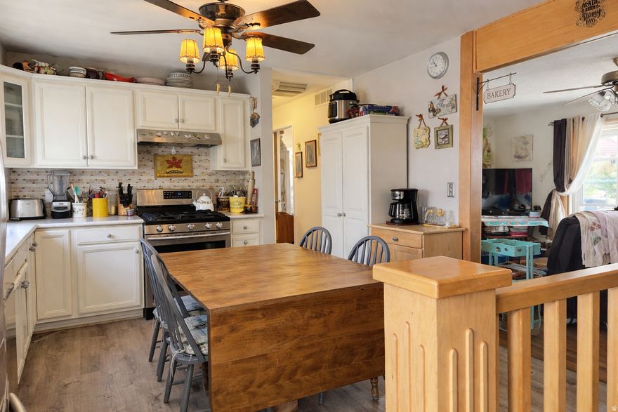 Bright, open home in a quiet neighborhood with abundant natural light and gorgeous mountain views from the kitchen and backyard. New kitchen (2019) with modern plumbing; water heater replaced 2 years ago. Carpet only on the stairs for easy maintenance. Main level offers spacious bedrooms; Beautiful living room with bay window, basement features familyroom & a private master suite with large walk-in closet, brand-new shower, separate jacuzzi tub, plenty of natural light, a second kitchen, oversized laundry room, and direct access to the backyard with an outdoor firepit-ideal for entertaining. Swamp cooler removed. Move-in ready with exceptional space and flexibility.