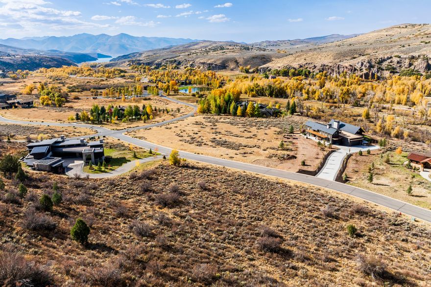 This exceptional lot at Victory Ranch in Utah offers a rare opportunity to create your dream home just steps from the Upper Provo River. Nestled in a private cul-de-sac, the location offers stunning panoramic views of the Rock Cliffs, Uinta Mountains, the Provo River, and Deer Valley ski runs. Beat 5 is just steps away to enjoy private, world class fly-fishing. With its prime location and natural beauty, this lot is the perfect canvas for your mountain home. Enjoy the tranquility and outdoor adventure that comes with living at Victory Ranch where amenities include our top rated 18-hole Rees Jones designed golf course, world-class fly-fishing, miles of mountain biking and hiking trails, 5-stand shooting facility, 4x4 adventures, snowmobiles, backcountry yurts, fishing ponds, multiple restaurants, a ski-in/ski-out lodge in Park City and more than 3,500 acres of untouched backcountry. Enjoy the newly completed Golf Club house which features state-of -the art simulators, our newest upscale fusion-style restaurant, and well-appointed Pro Shop. Also, enjoy a quick stroll to The Post Clubhouse to enjoy our year-round heated pool and the Freestone for evening dinners. Our Barn amenity features a pizza parlor, art studio, game room, indoor basketball court as well as a fitness center and beautiful spa, 75-foot swimming pool and waterslide. Our tennis, year-round paddle courts, and new pickleball courts will be sure to provide hours of family fun. Victory Ranch is approximately 15 minutes from Deer Valley and 25 minutes to Park City.