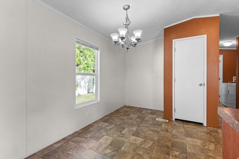 Tiny photo for 8506 SUNSET HILLS DR #180, Magna, UT 84044 (MLS # 2154095)