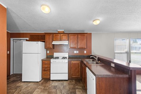 Tiny photo for 8506 SUNSET HILLS DR #180, Magna, UT 84044 (MLS # 2154095)