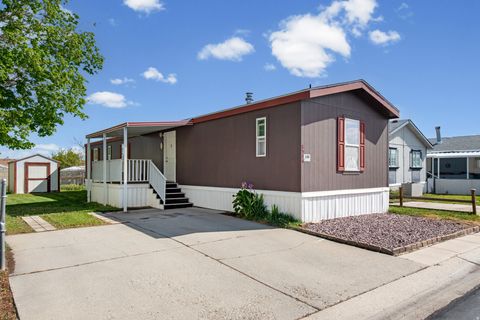 Photo of 8506 SUNSET HILLS DR #180, Magna, UT 84044 (MLS # 2154095)
