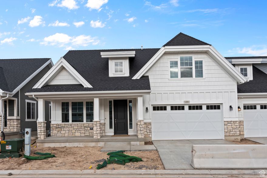 Come see this beautiful brand new Willowcreek home in a great community! Featured you will find a modern kitchen with white laminate cabinets, quartz countertops, and stainless steel gas appliances, enhanced by a stylish tile backsplash. Flooring includes laminate hardwood, tile, and carpet, paired with a dropped floor system for added comfort. Enjoy outdoor living with the expanded patio, while inside, details like wood railing at the stairway and two-tone paint add modern character. The owner's bathroom includes cultured marble shower surrounds and brushed nickel hardware for a relaxing retreat. The home is designed with green energy efficiency options for smart, sustainable living. Comes fully landscaped and is maintained by the HOA for easy care living!