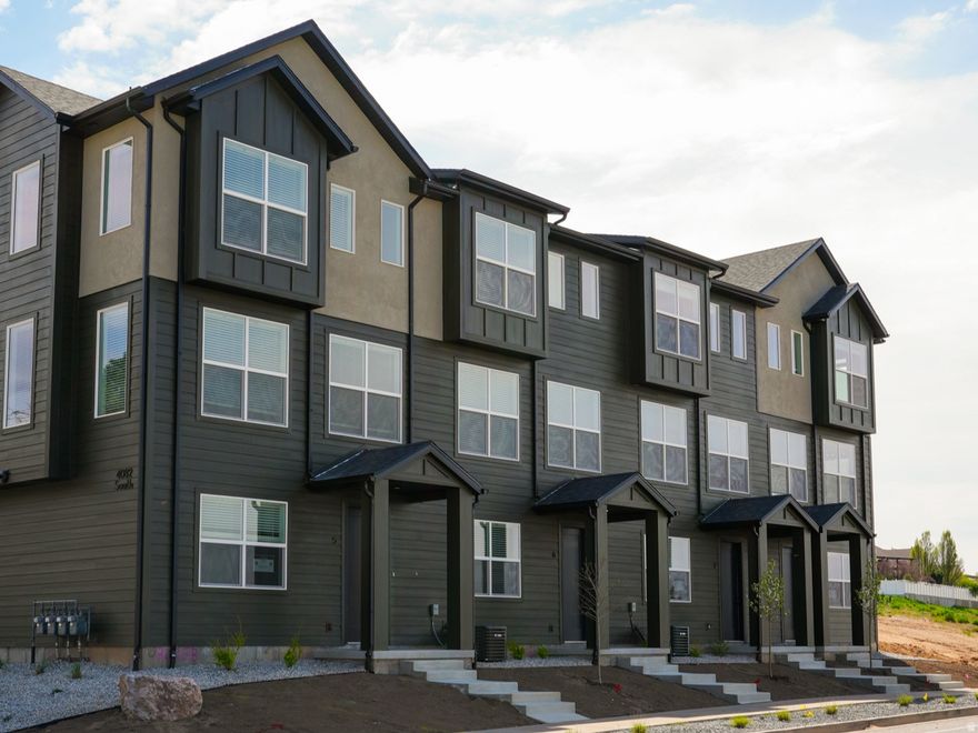 Introducing theHAZEL! Cole West's newest townhome community in the heart of Roy. theHAZEL offers modern 3-bedroom residences with thoughtfully designed layouts, curated finishes, and attached 2-car garages. These homes are fully move-in ready, complete with included appliances-washer and dryer, refrigerator, and more. Located adjacent to the FrontRunner station, this community delivers seamless access to commuting while placing you near local dining, shopping, and everyday conveniences. Experience refined, low-maintenance living in a community designed for both style and function. Welcome home to theHAZEL. Ask about our lender incentives!