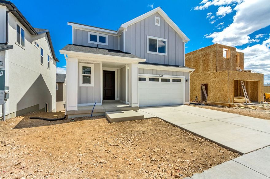 ***Rates as low as 3.75% Restrictions apply: Contact us for more information***Welcome to the Elm plan, a thoughtfully designed home offering 1,619 square feet of finished living space with 3 bedrooms and 2.5 bathrooms. The open-concept main level seamlessly connects the living, dining, and kitchen areas, creating a bright and functional space for everyday living and entertaining. The 10' sliding door in the dining area is a showstopper! Upstairs features a private primary suite with an en-suite bath and walk in closet, along with two additional bedrooms and a full bathroom and conveniently placed laundry room. A 708 square foot unfinished basement provides endless potential for future expansion or storage, making this home as versatile as it is inviting. This home also provides a unique opportunity with a walk out basement door. There are special lending promotions when using the builder's affiliated lender-check with agent for details.
