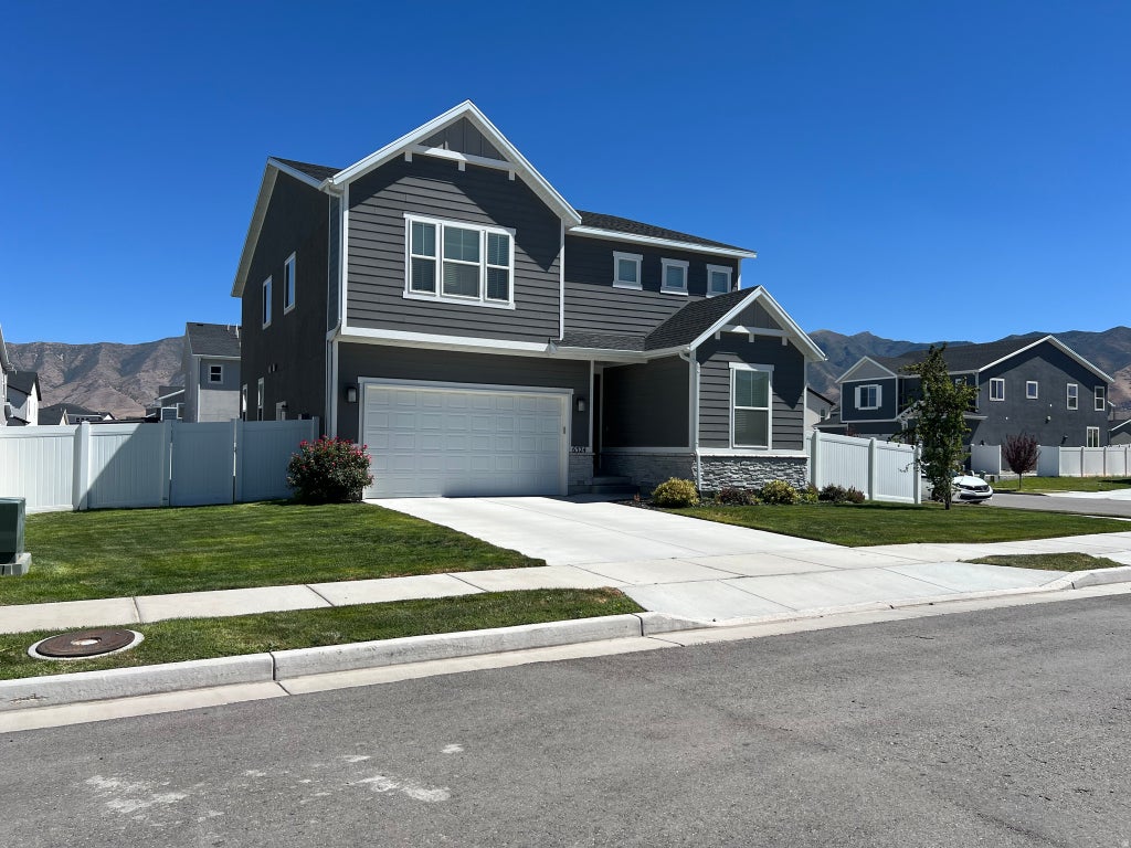 Photo of 6324 N RED COLT LN, Stansbury Park, UT 84074 (MLS # 2184122)