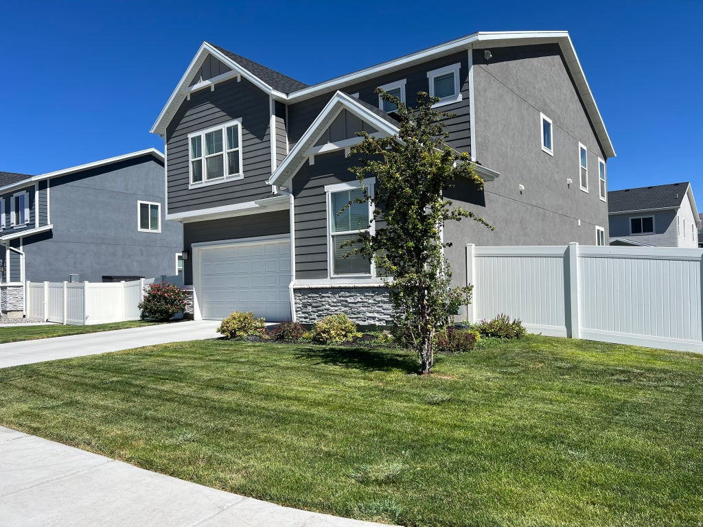 Photo of 6324 N RED COLT LN, Stansbury Park, UT 84074 (MLS # 2184122)