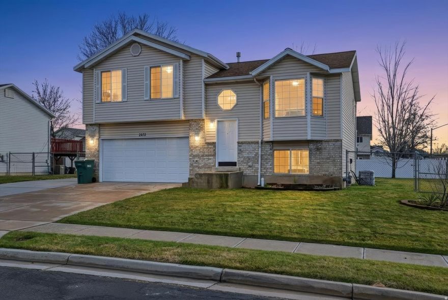 Welcome to this well-maintained, thoughtfully updated home tucked into a quiet neighborhood. Enjoy newer Laminate Plank flooring and carpet throughout, solid-surface countertops, and the convenience of all appliances included. The basement family room offers flexibility and can easily serve as a fourth bedroom, with the laundry area already plumbed for a future bathroom. Outside, you'll find a spacious 16x24 detached garage/shop with electrical, plus a generous 63' x 11.5' RV parking along the side of the home and an additional shed for extra storage. Newer roof, HVAC and Water heater. Relax or entertain on the Trex deck overlooking the fully landscaped, fenced backyard. Exceptionally clean and truly move-in ready.