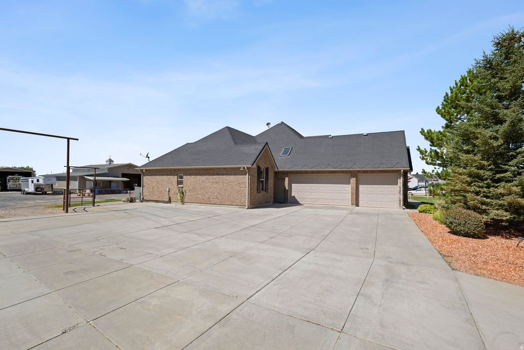 Photo of 1829 W HERITAGE RANCH DR N, Farr West, UT 84404 (MLS # 2151108)