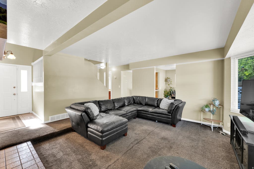 Photo of 4417 S DUNRAVEN DR, West Valley City, UT 84119 (MLS # 2170763)