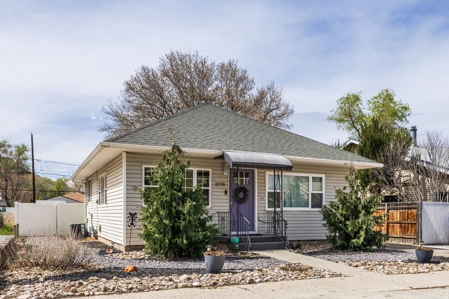 Don't let the size fool you - this one lives large. Two bedrooms, two bathrooms, and both bedrooms feature a private bath.  The updated kitchen is ready for real cooking, and the layout makes every square foot count. Cozy, functional, and full of charm - this is the kind of home that just feels right the moment you walk in. Step outside and you'll find one of the most delightful setups in the area - a generous lot shaded by mature trees, off-street parking, storage sheds, and the most darling chicken coop you've ever laid eyes on. Whether you're dreaming of backyard chickens or simply want the space to breathe, this lot delivers. Location? Hard to beat. Walking distance to schools and all the shops and restaurants of downtown Magna, with a commute to downtown Salt Lake City that clocks in at right around 20 minutes. You get the quiet neighborhood feel without giving up a thing. Affordable, move-in ready, and genuinely one of a kind. Come see it before someone else does.