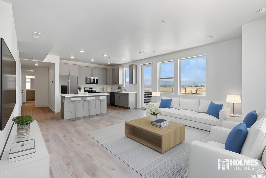 Modern condo across from Downtown Daybreak. Walk to shops, dining, parks, & entertainment. Open floor plan with natural light & contemporary finishes. Limited-time selections available. Next to UTA TRAX Red Line. Visit sales office at 5263 W Reventon.