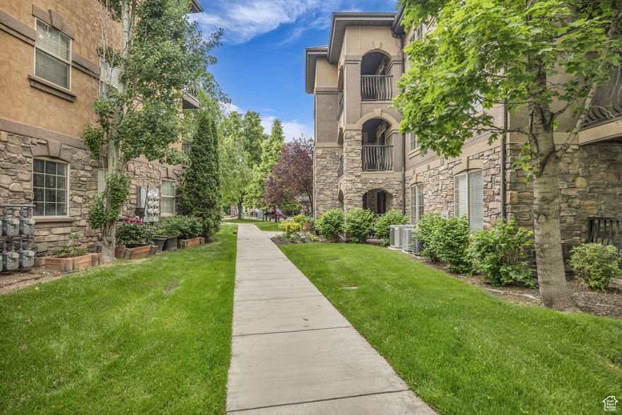 Top-floor condo with vaulted ceilings in the highly sought-after Belle Monet community-enjoy the privacy of no upstairs neighbors and stunning mountain views from two private balconies, including one off the master bedroom. Inside, you'll find vaulted ceilings and granite countertops that add style and charm throughout. The open layout is perfect for everyday living or entertaining. Community amenities include a pool, clubhouse, gym, theater room, and two beautifully maintained parks with playgrounds. With quick access to I-15 and just minutes from restaurants, shopping, and entertainment, this home blends comfort, elegance, and convenience. One car garage and one assigned open parking space. Square footage figures are provided as a courtesy estimate only and were obtained from county records . Buyer is advised to obtain an independent measurement.