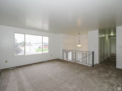 Tiny photo for 3376 W SUNNYBROOK DR, West Valley City, UT 84119 (MLS # 2114839)