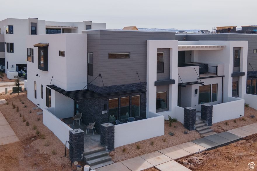 Desert Color inventory at $209,999??? This home is being sold in 1/8th Ownership. You now have the ability to Co-own a 5 bedroom 5 bathroom townhome complete with all luxury furnishings/decor and a balcony hot tub, and at a fraction of the price!!! Offset your cost of luxury ownership by 87% with other owners. This home is also approved for Nightly Rental! Get ready to enjoy vacation time or rent-it out nightly at one of Southern Utah's most incredible communities. And yes, they seriously built a 2.5 acre swimming pool and surrounded it by white sands and palm trees! If you haven't checked out an EmberHome yet or the Desert Color community, you are missing out! Call for more details about the Co-Ownership model, and the home itself. We believe in low pressure, and high education. Monthly operating costs estimated at $491 per month per 1/8th Ownership (Includes utilities, maintenance, HOA, Reserve Fund Cont, Prop Tax, Management, Homeowner's Insurance).    Square footage figures are provided as a courtesy estimate only and were obtained from the Builder. Buyer is advised to obtain an independent measurement.